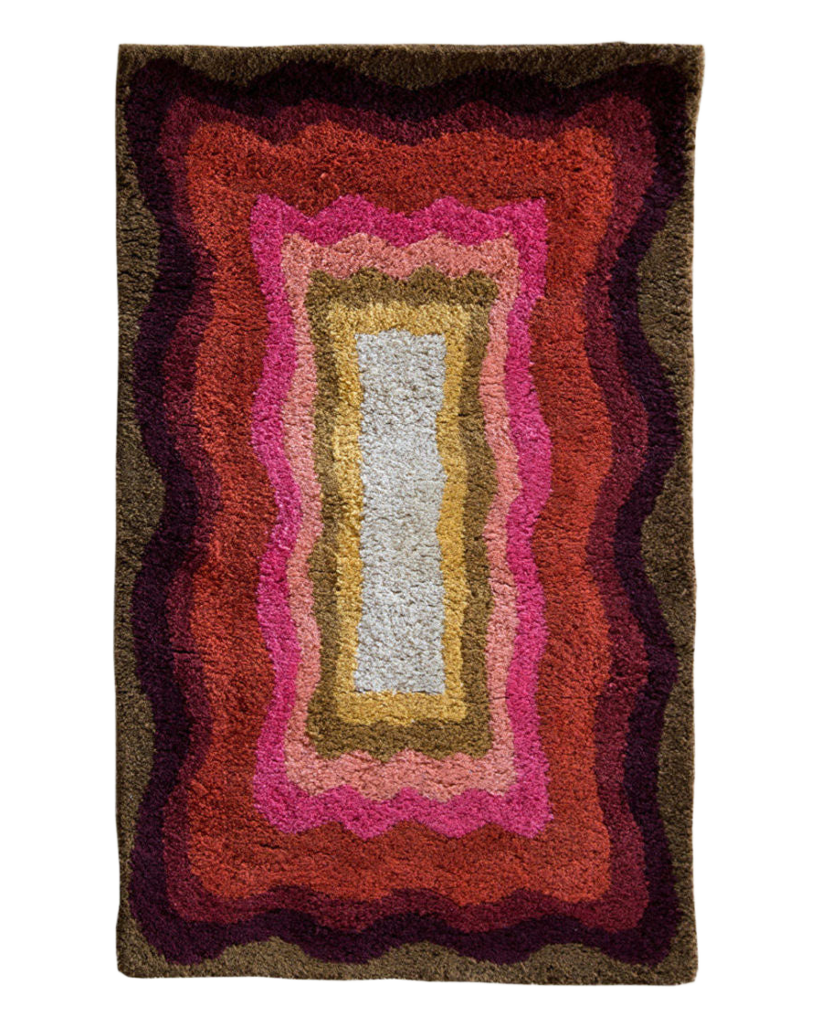 Alden Sunset wool area rug by Angela Adams in warm sunset tones
