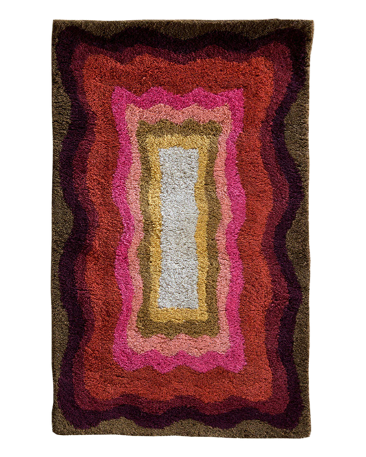 Alden Sunset wool area rug by Angela Adams in warm sunset tones