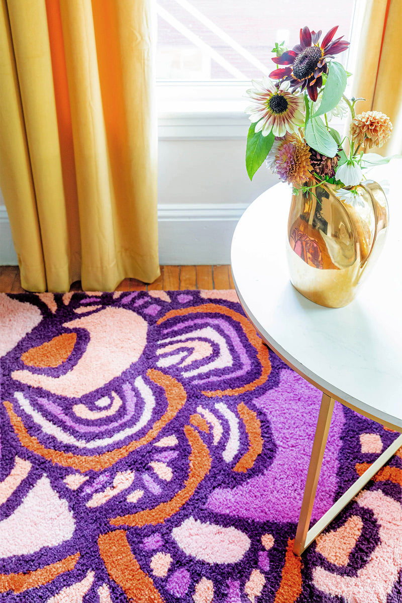 Maeve Tulip wool area rug by Angela Adams in blooming tulip purple