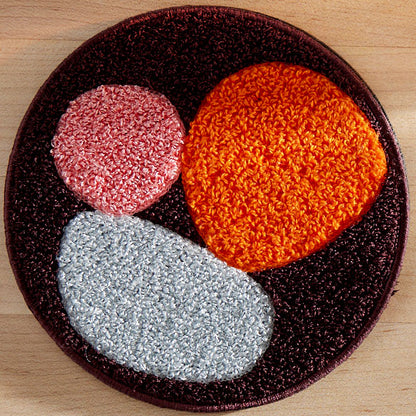 Three Stones Rust Mug Rug