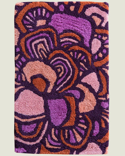 Maeve Tulip wool area rug by Angela Adams in blooming tulip purple