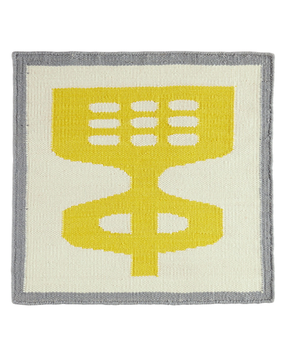 Dandipod Sunny wool area rug by Angela Adams in bright dandelion yellow