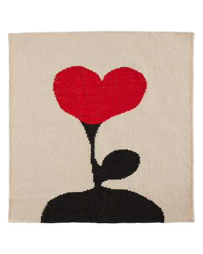Love Blossom Crush wool area rug by Angela Adams in graphic black with a blossom