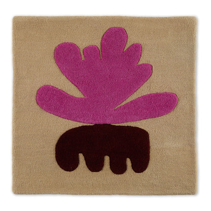 Sea Flower Rugosa wool area rug by Angela Adams in rosy rugosa pink