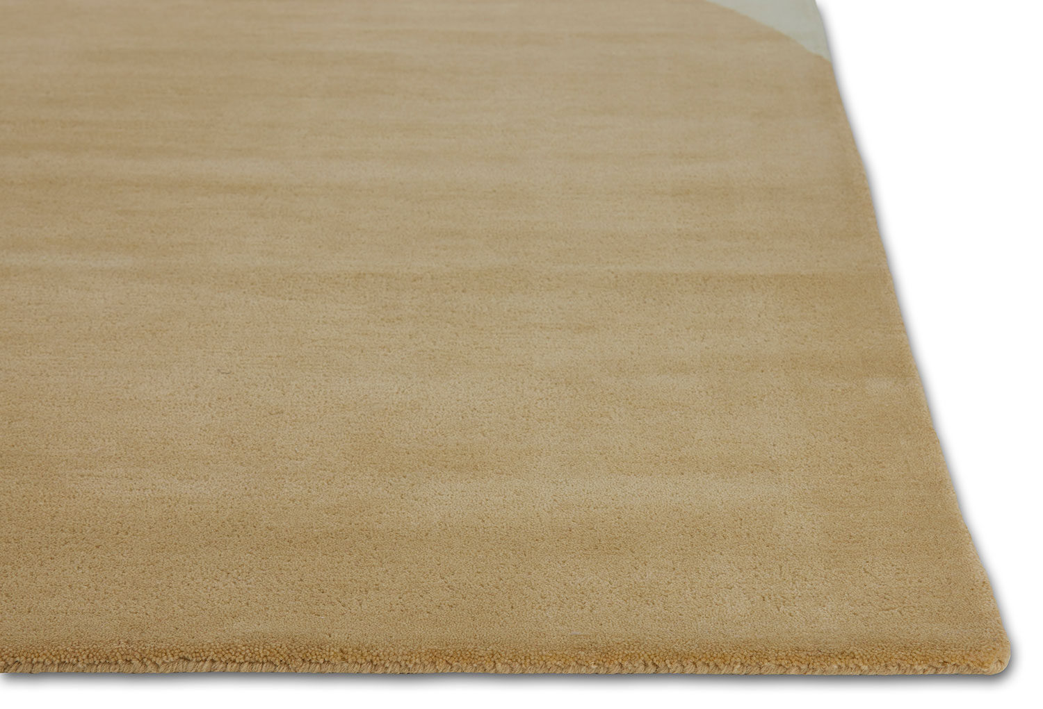 A Beige colored close up of an area rug called Dove Peace by angela adams
