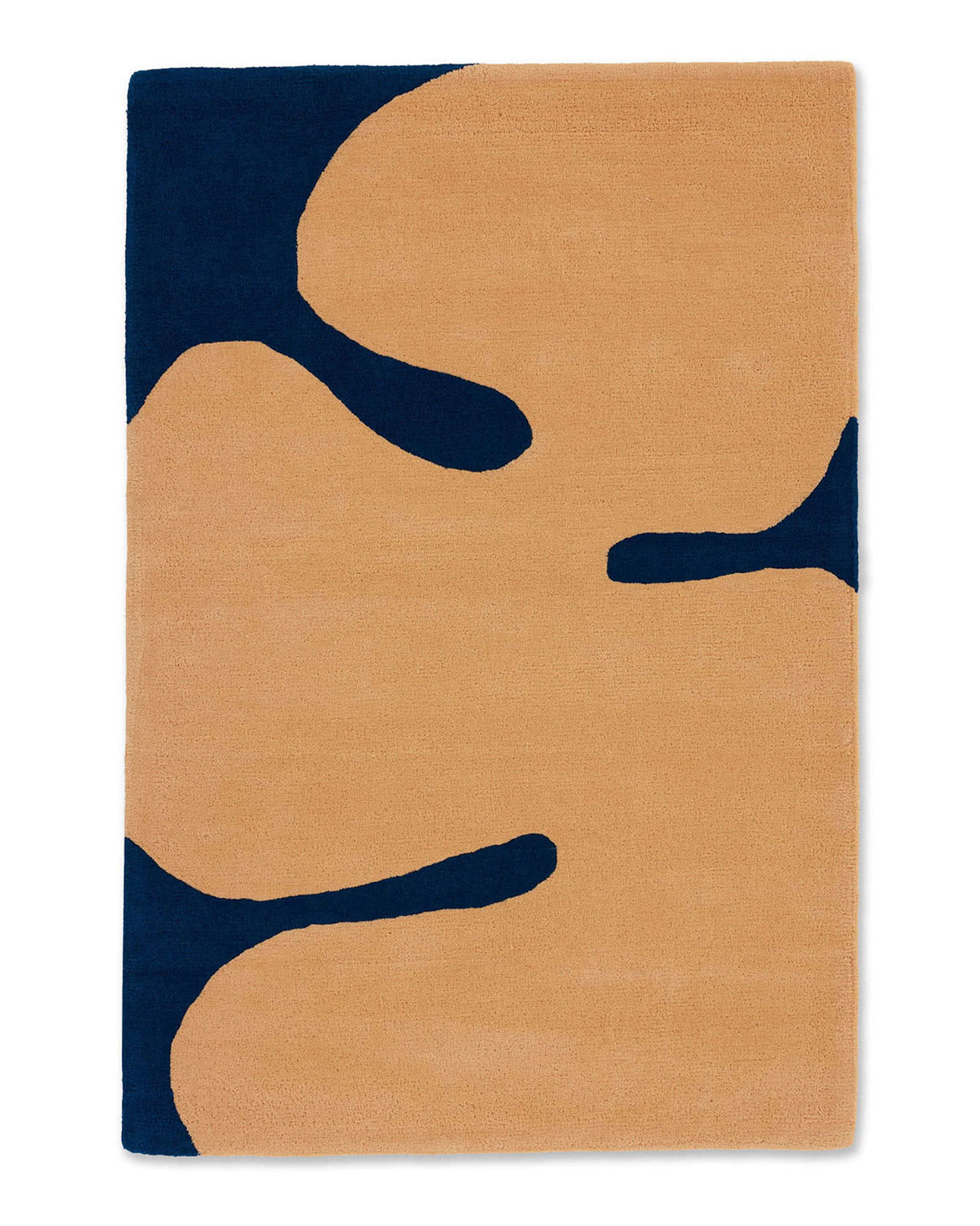 Navy plush luxury rug with a rounded organic peach shape in the center.