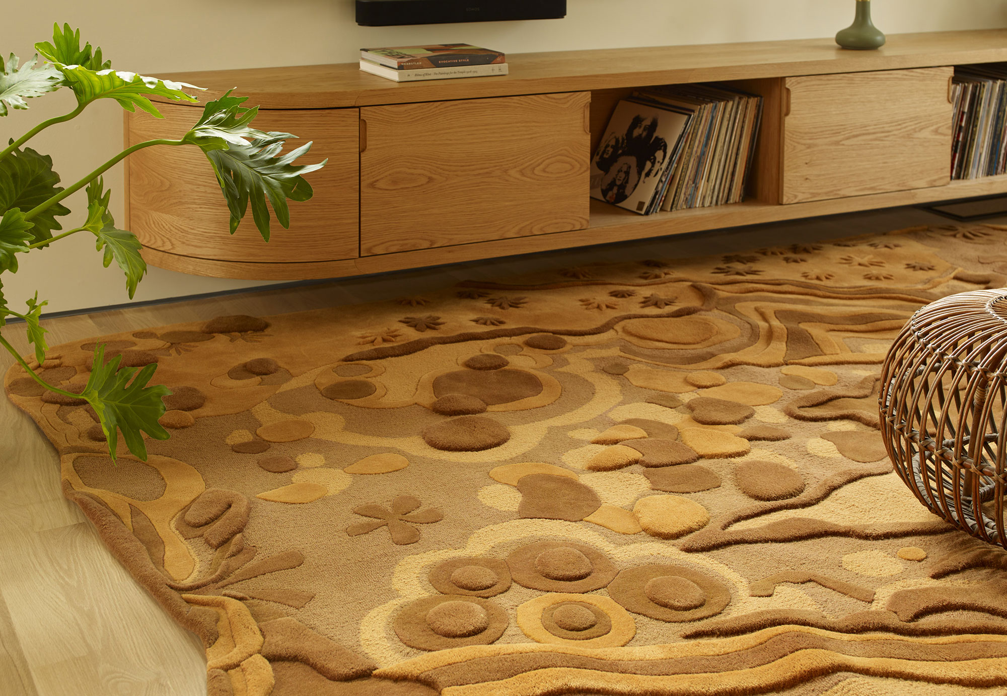 A warm brown living room rug called Eden Desert
