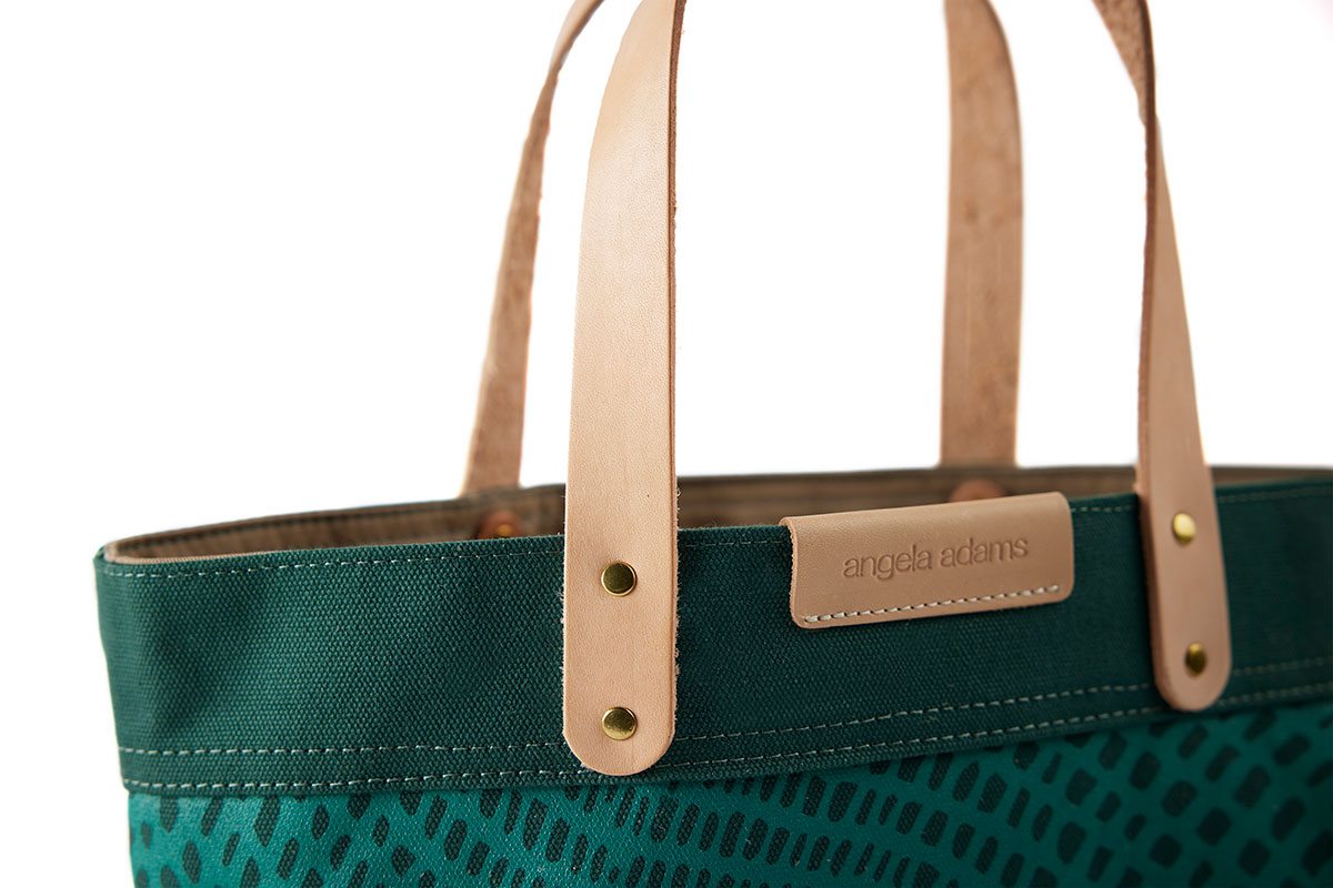 Close up detail of Dark green and teal colored tote by Angela Adams