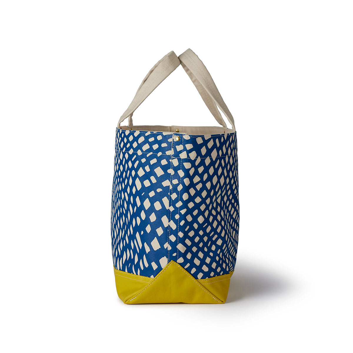 Side profile of Blue and yellow modern tote by Angela Adams