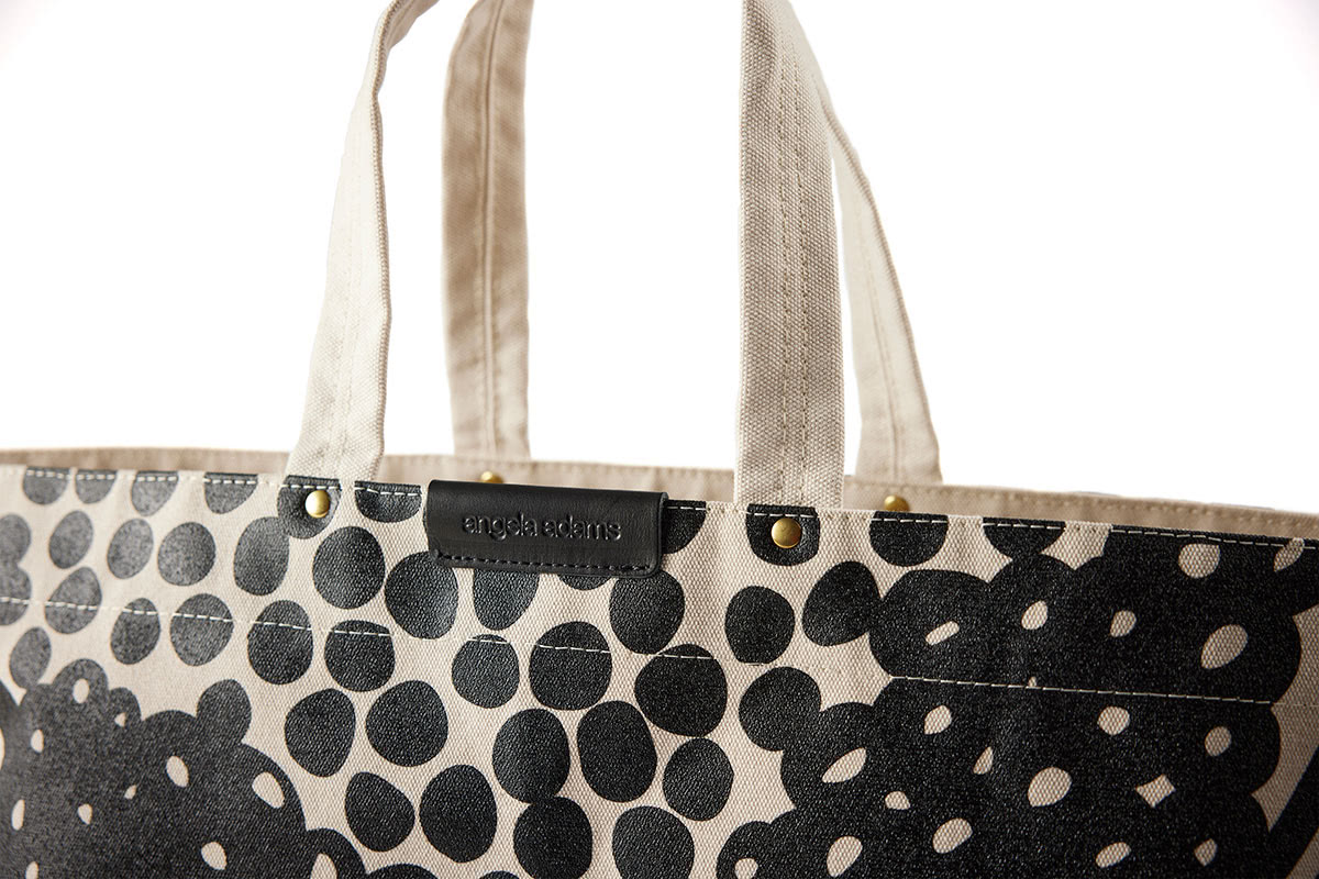 Close up detail of Black and tan colored tote by Angela Adams