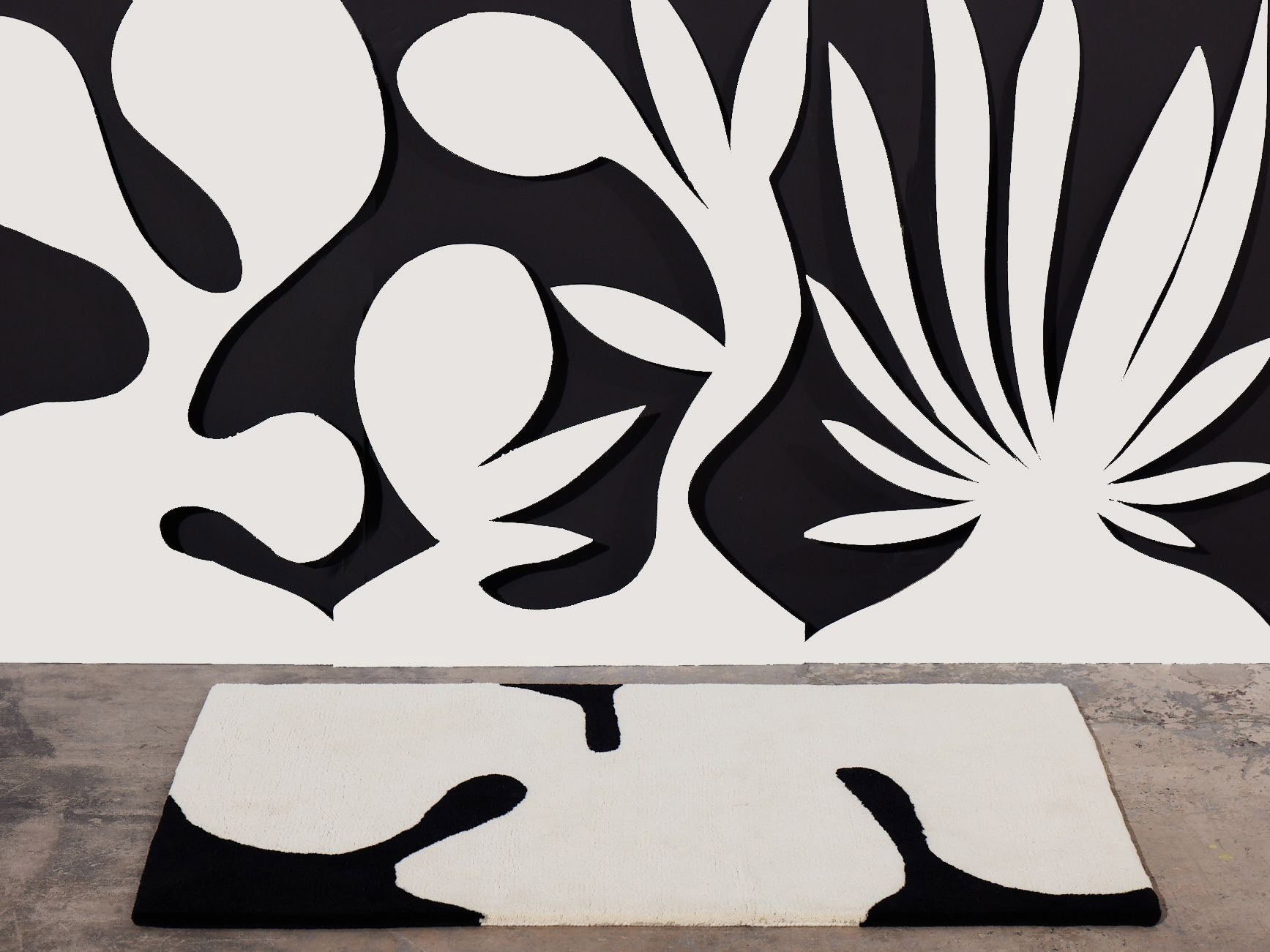 A black and white modern area rug called Astrud Coconut