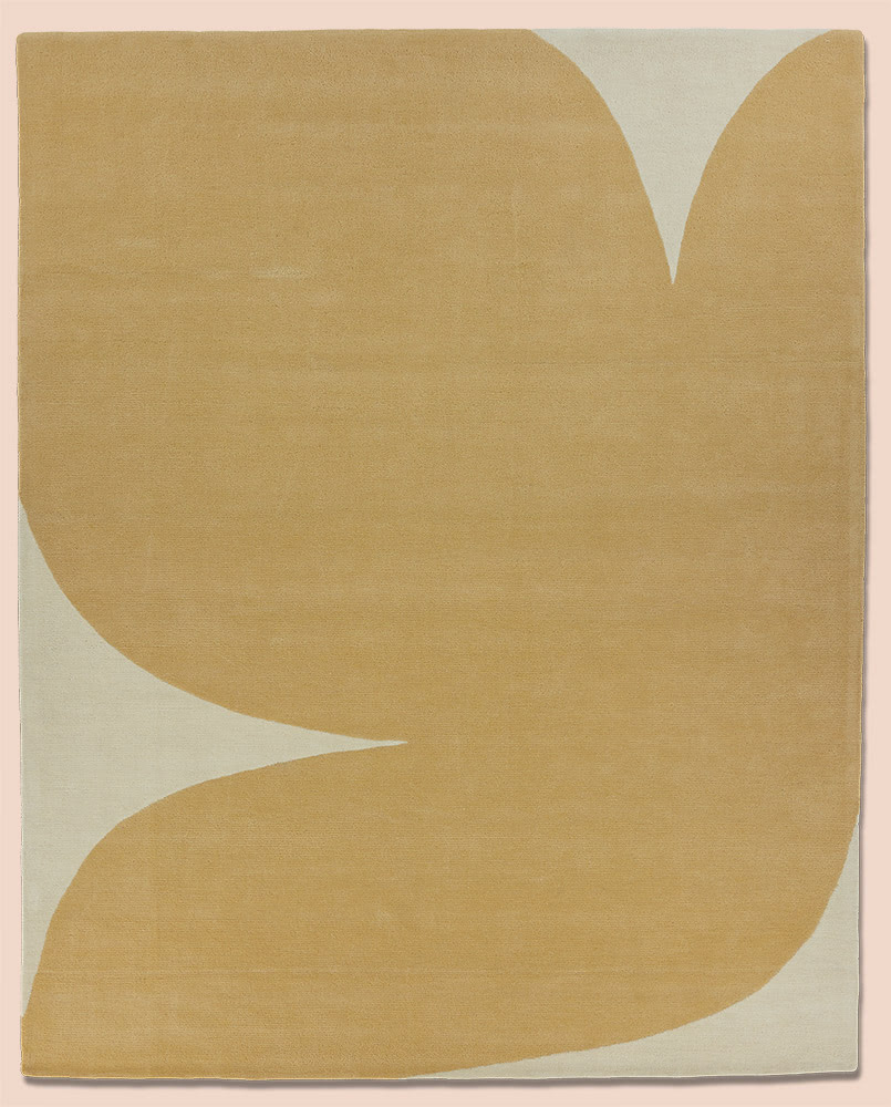 A modern area rug called Dove Peace in tan colors