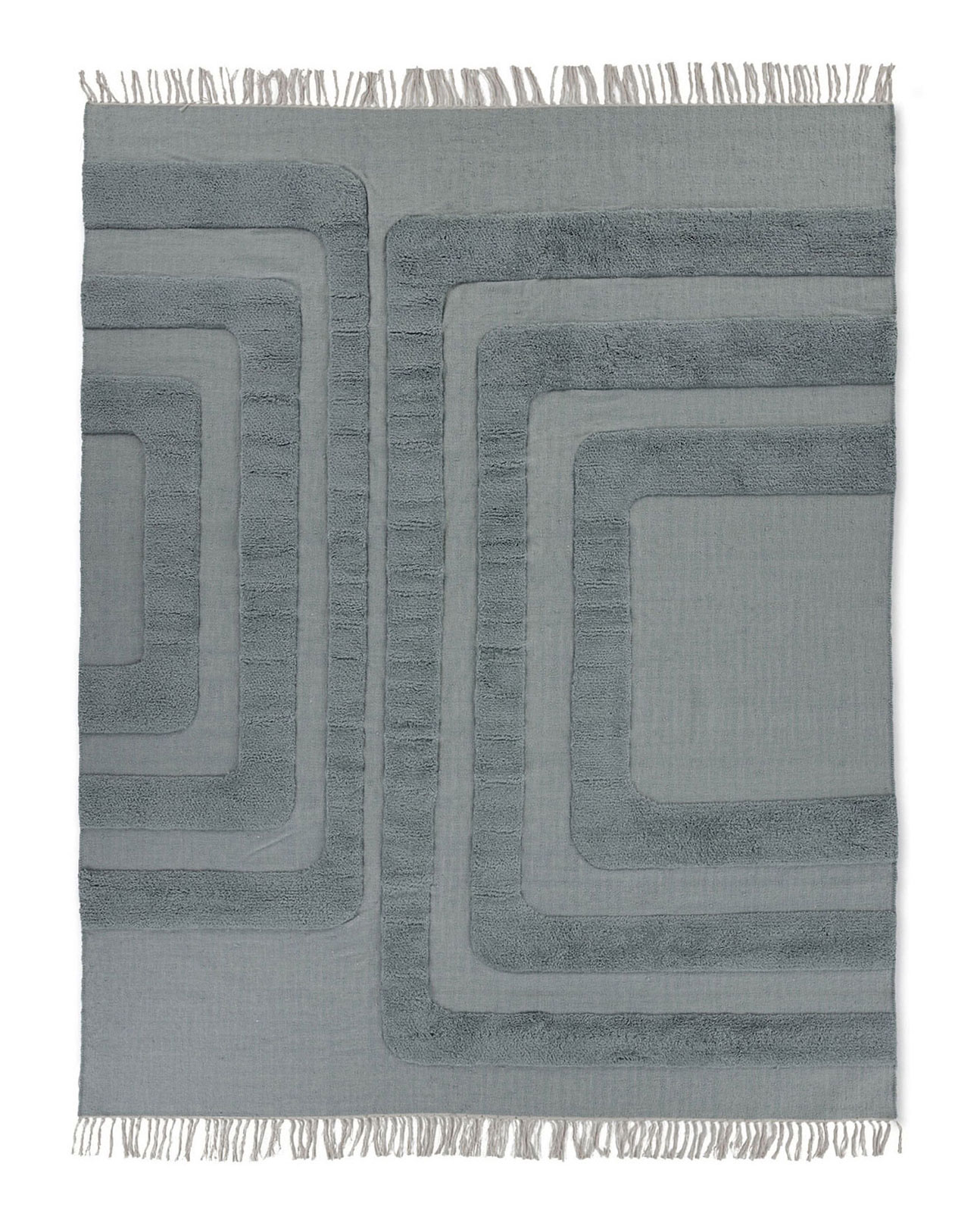 Woven neutral gray area rug with tufted organic archways and fringe.