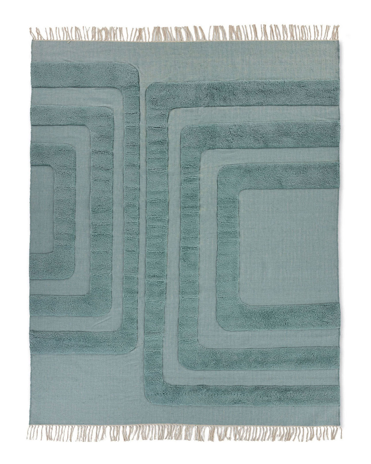Woven slate blue area rug with tufted organic archways and fringe.