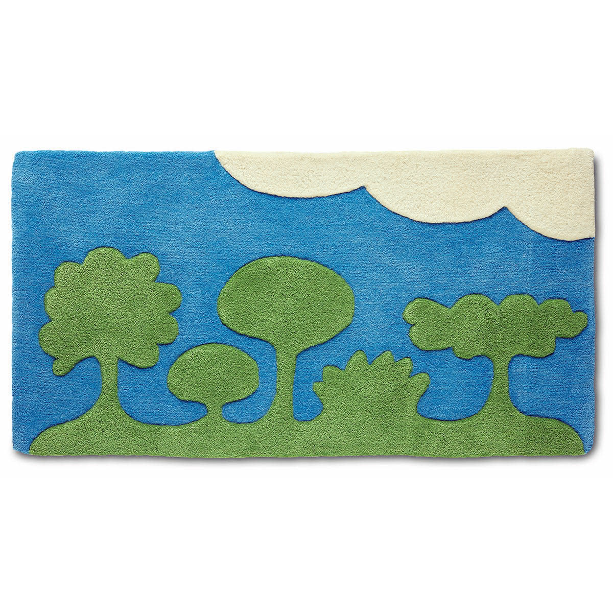 A small rug with green trees and blue sky.