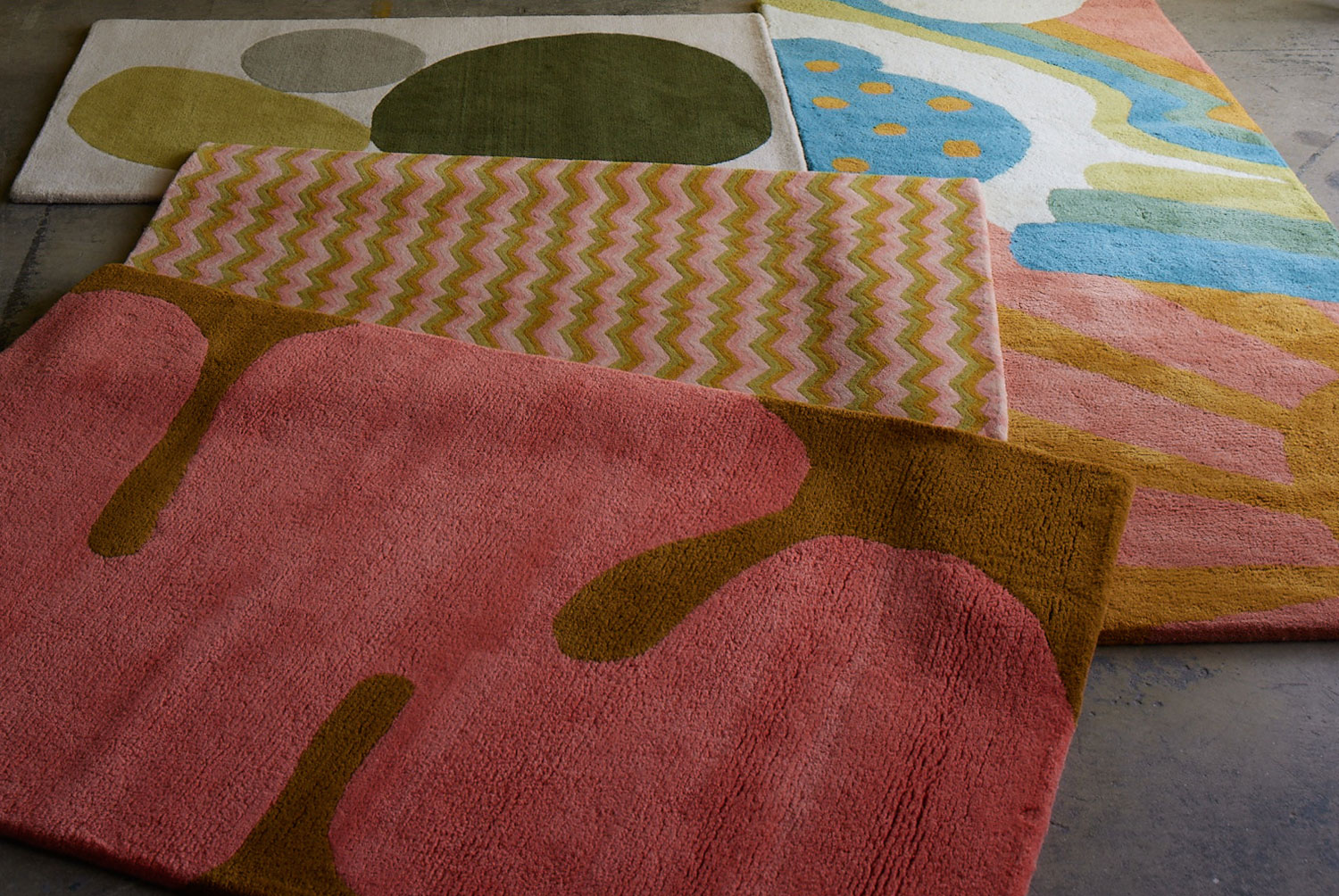 Astrud Flamingo area rug with other colors by Angela Adams