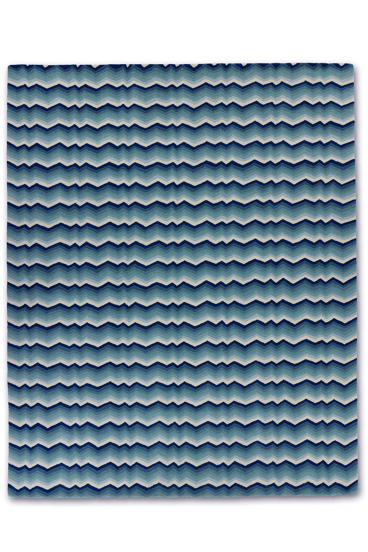 A large, modern area rug in blue tones called Buzz Blue
