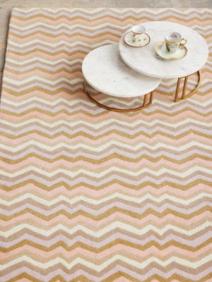 A large, modern area rug in cream tones called Buzz Dream