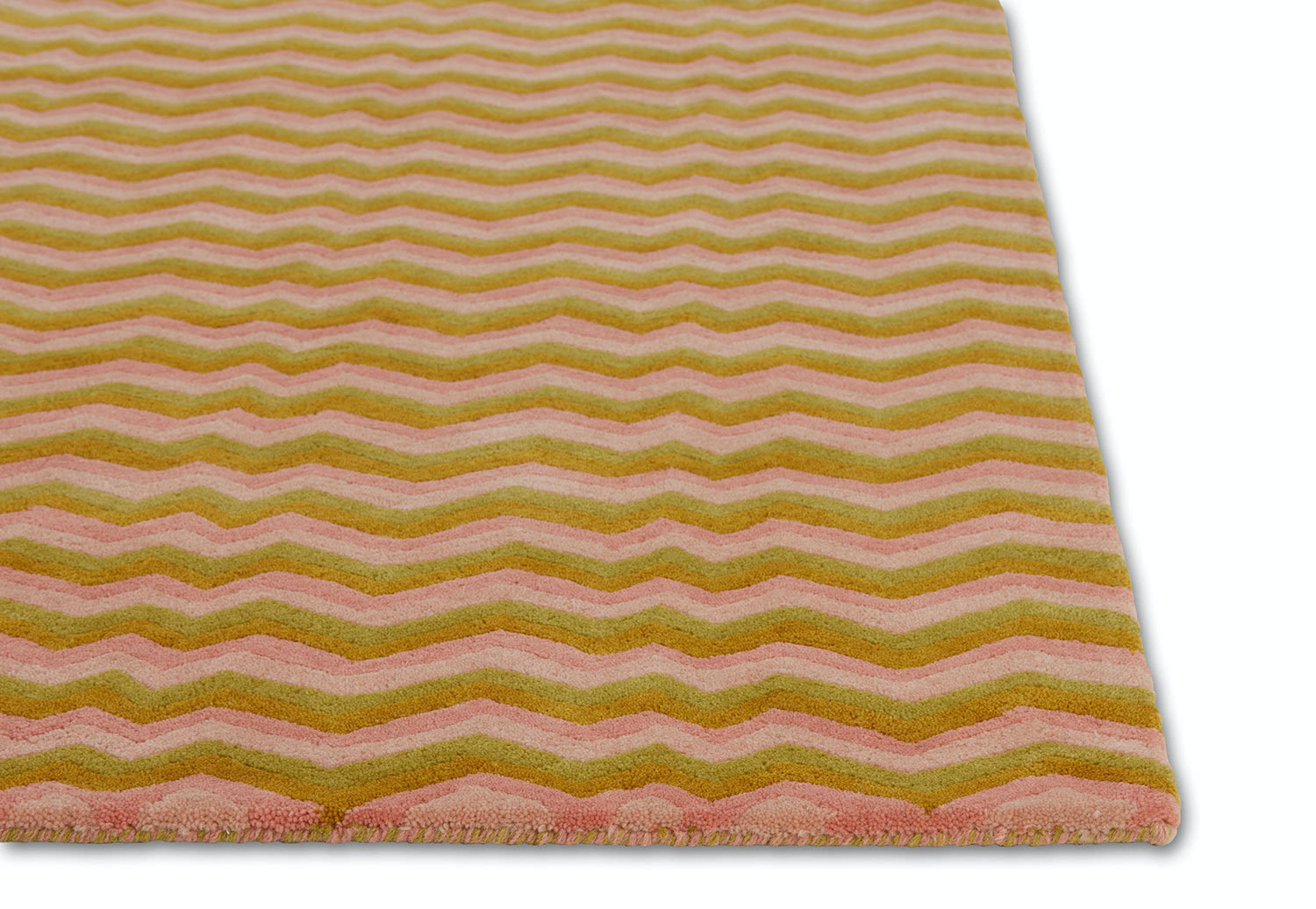 A detail of a modern area rug in pink tones called Buzz Opal