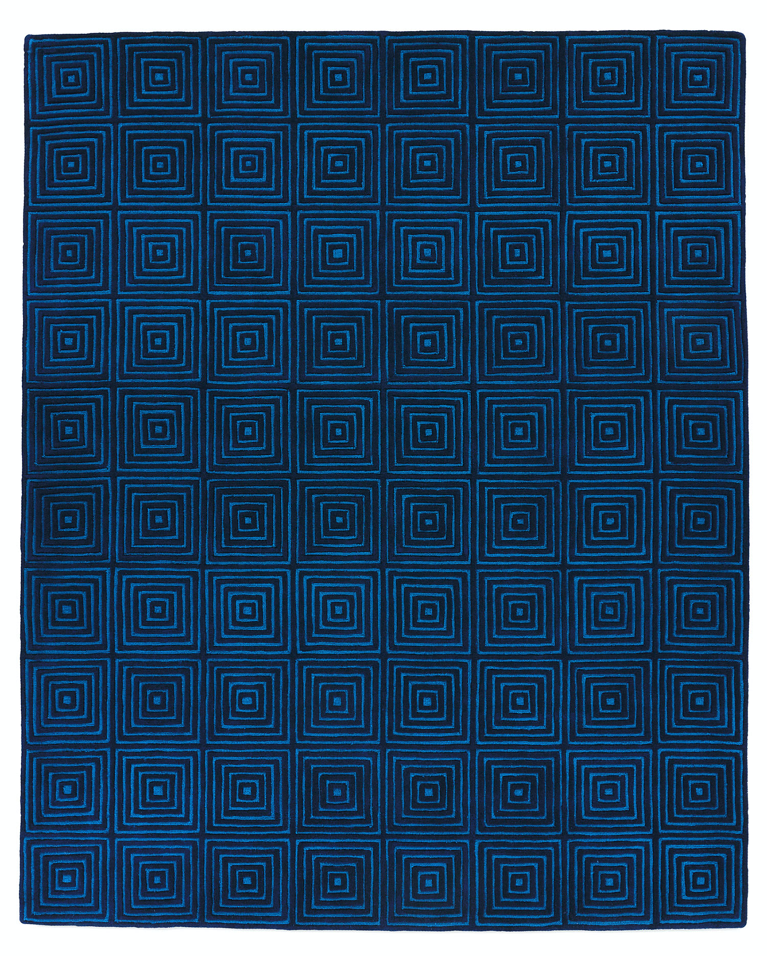 A deep blue, modern area rug called Duke Blue by Angela Adams