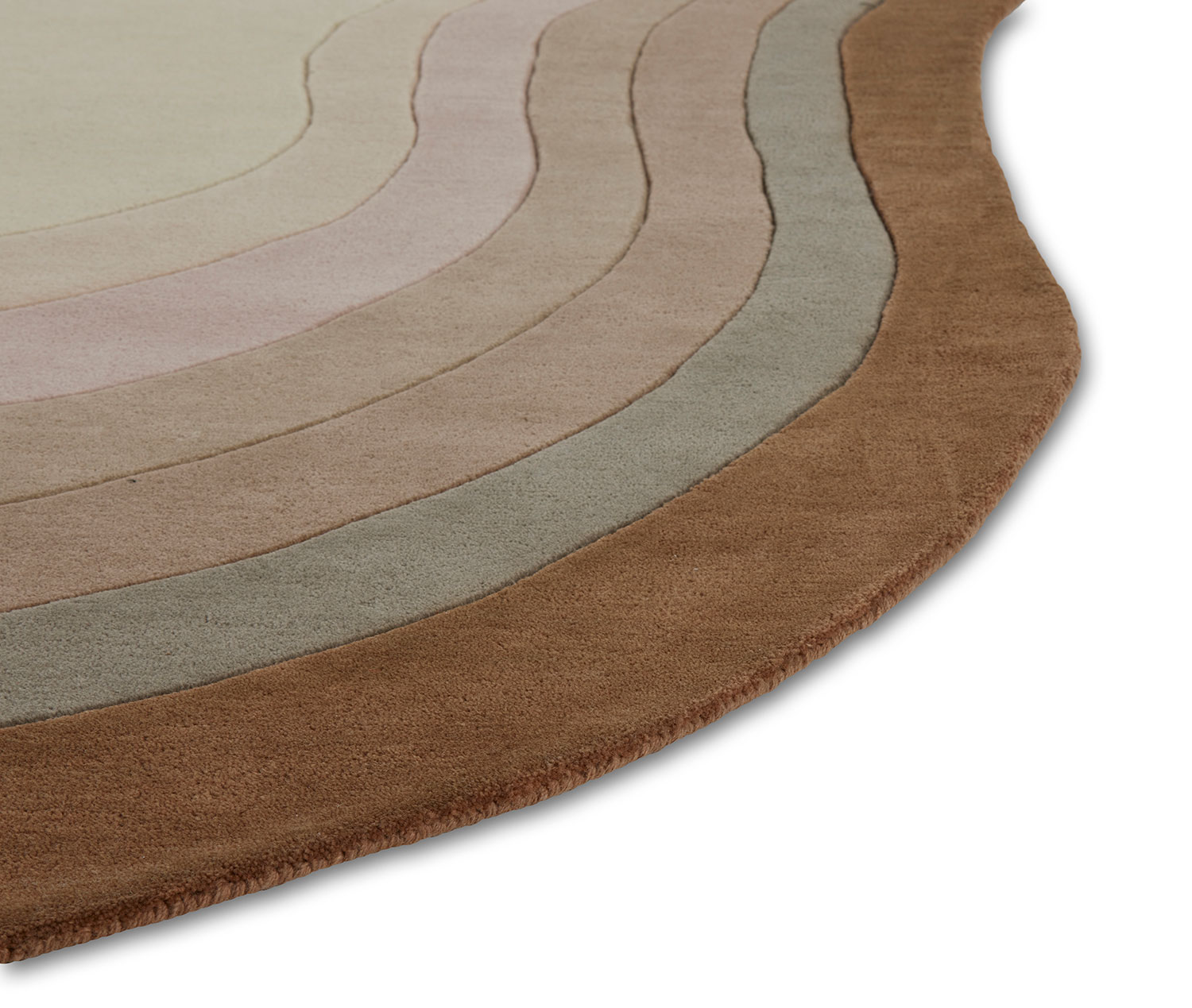 A close up of a neutral gradient area rug called Pool Heaven in the shape of a pool