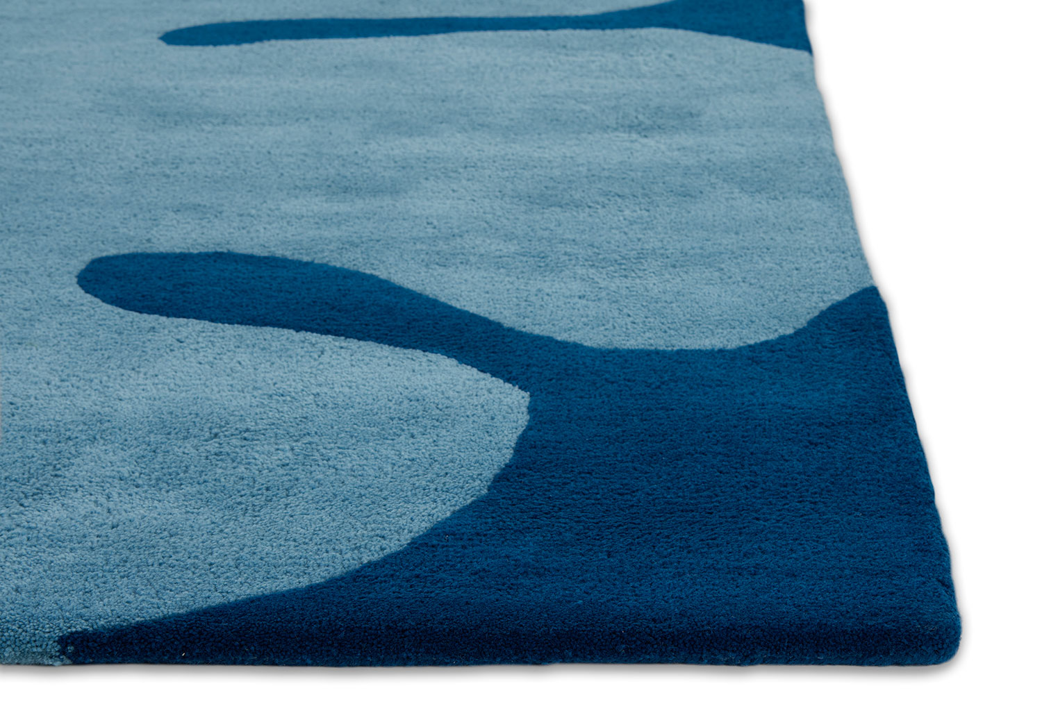 A detail of Angela Adams Astrud Splash blue area rug