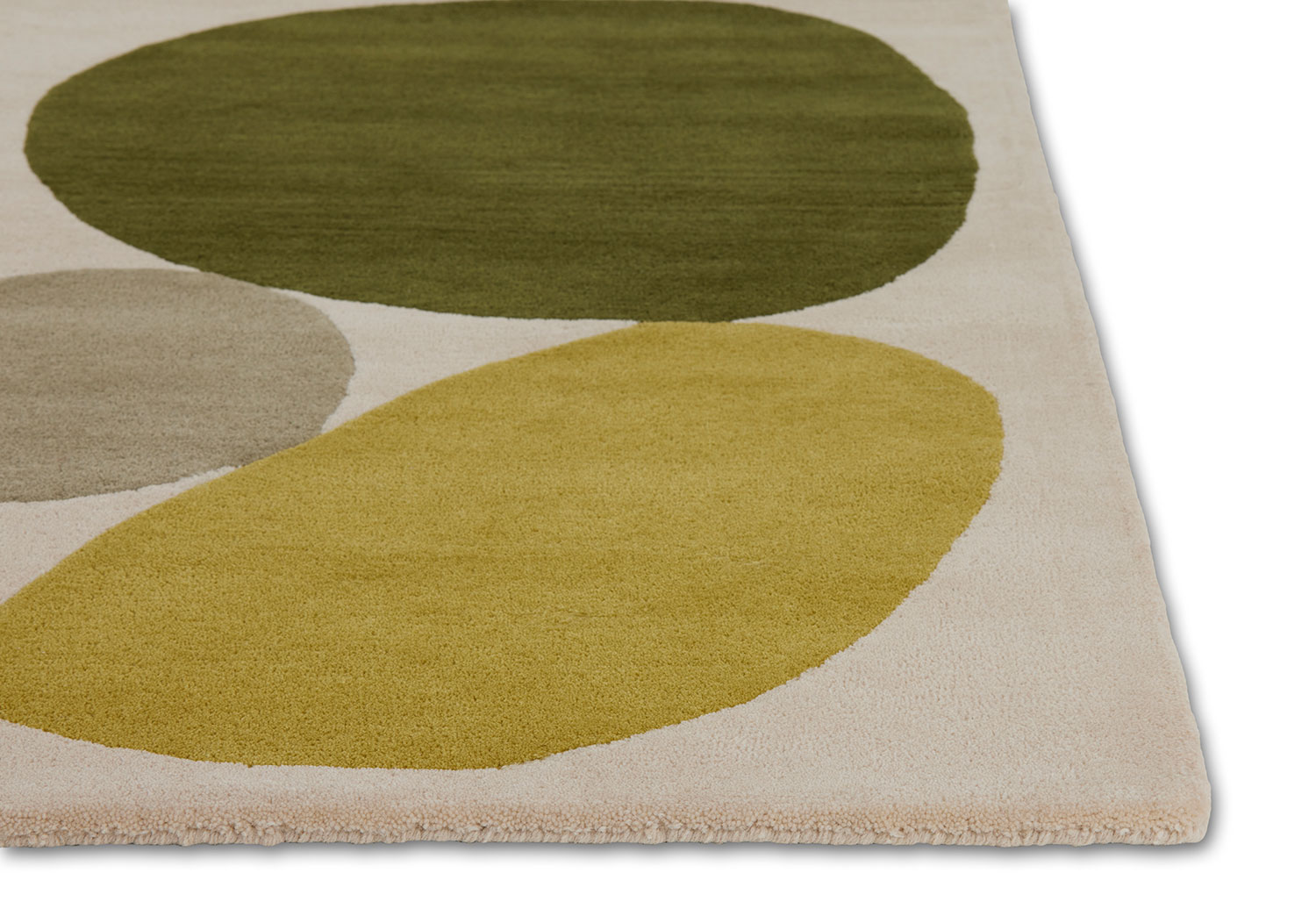 A corner of a modern rug called Three Stones Moss