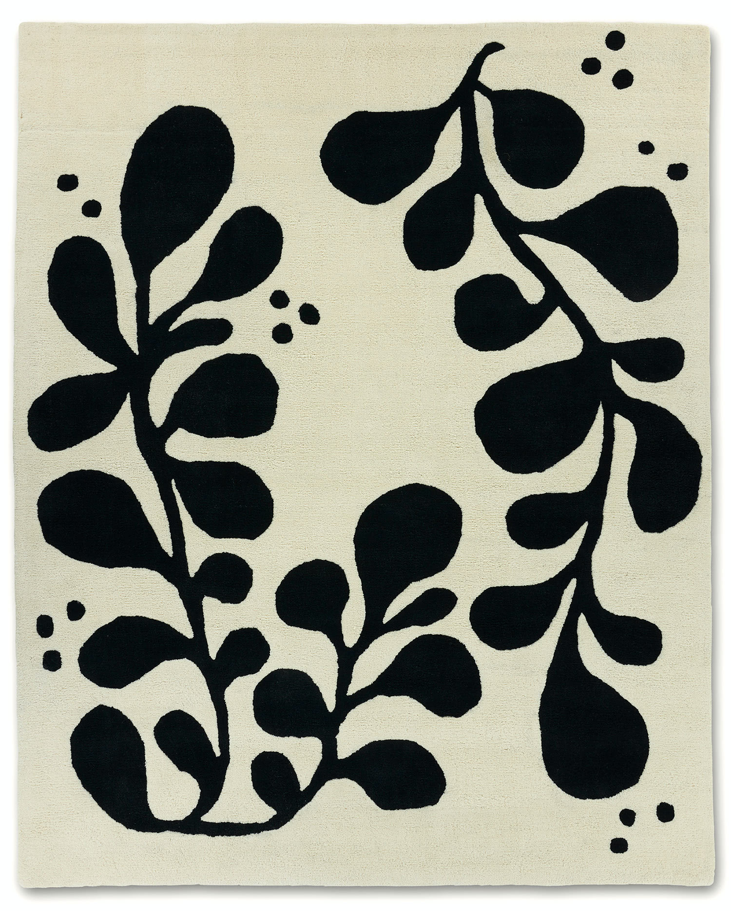 A neutral and black area rug with abstract designs on it called Vine Tango