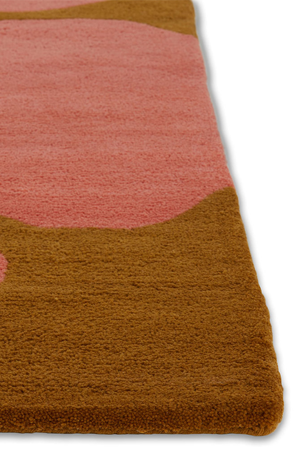 A detail of Angela Adams Astrud Flamingo pink area rug