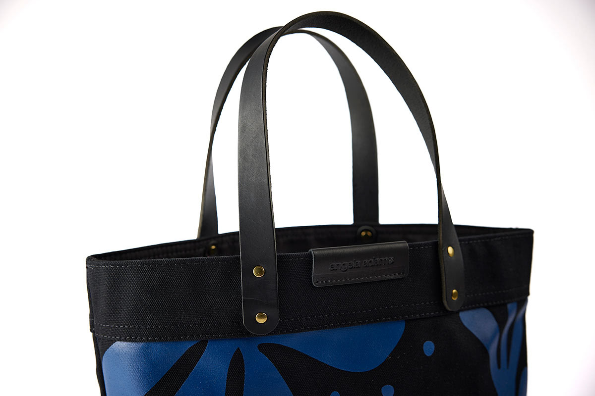 Close up detail of Black and blue Floral print tote by Angela Adams