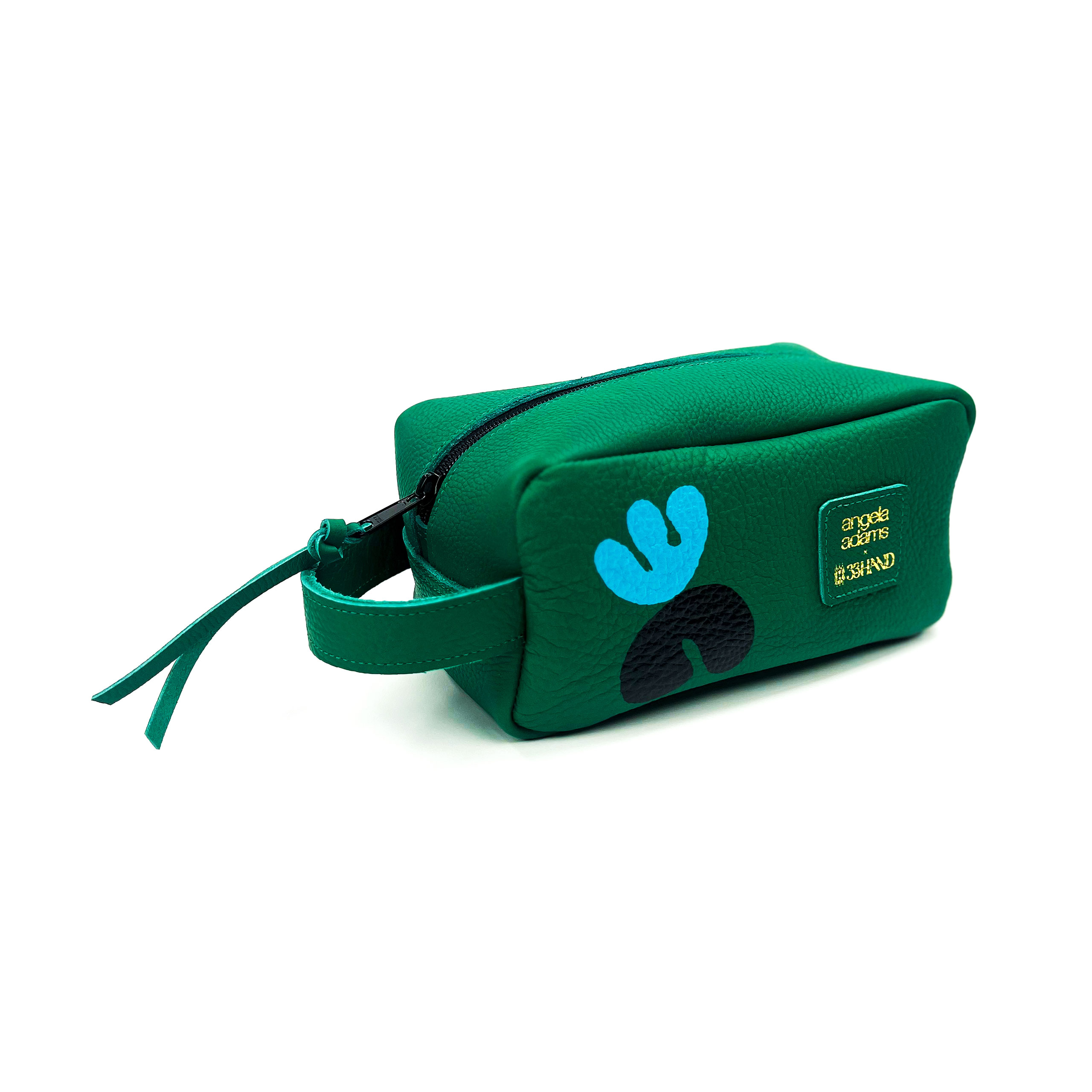 Green cosmetic bag with a blue handprint logo and text on the side, positioned against a white background.